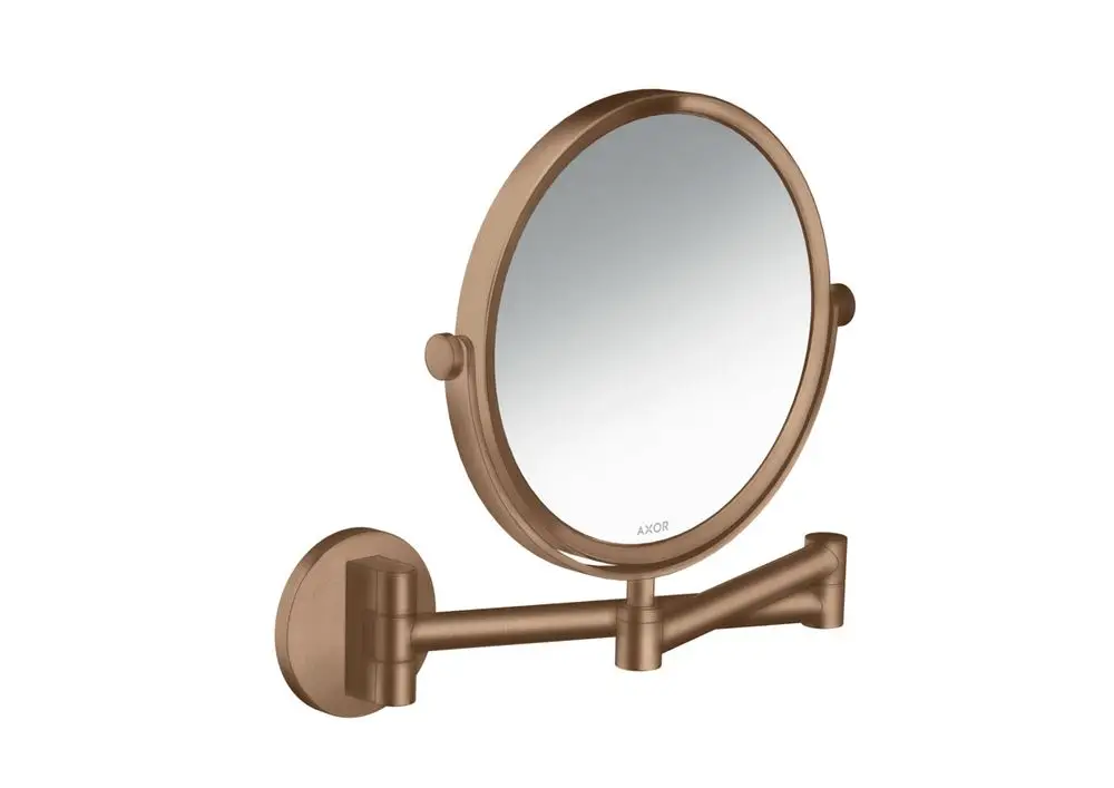 Wandmontierter runder Spiegel in gebürstetem Rotgold mit flexibler Halterung von AXOR. Der Spiegel bietet eine praktische Lösung für Rasur und Pflege.